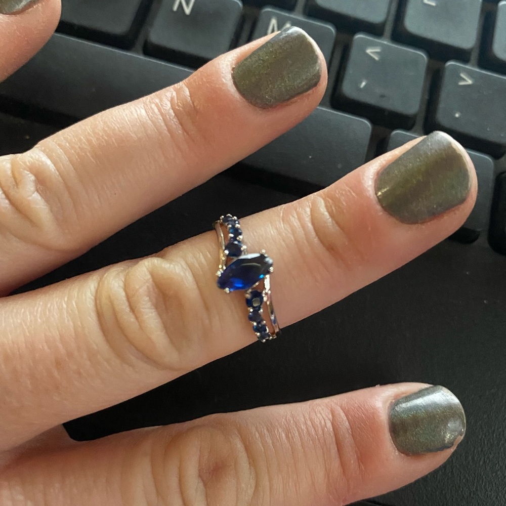 Silver and blue sapphire ring